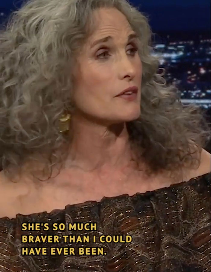 Mature woman with curly gray hair in a TV interview; text overlay about bravery. Related to "reverse nepotism" discussion. Mature woman with curly gray hair in a TV interview; text overlay about bravery. Related to "reverse nepotism" discussion.
