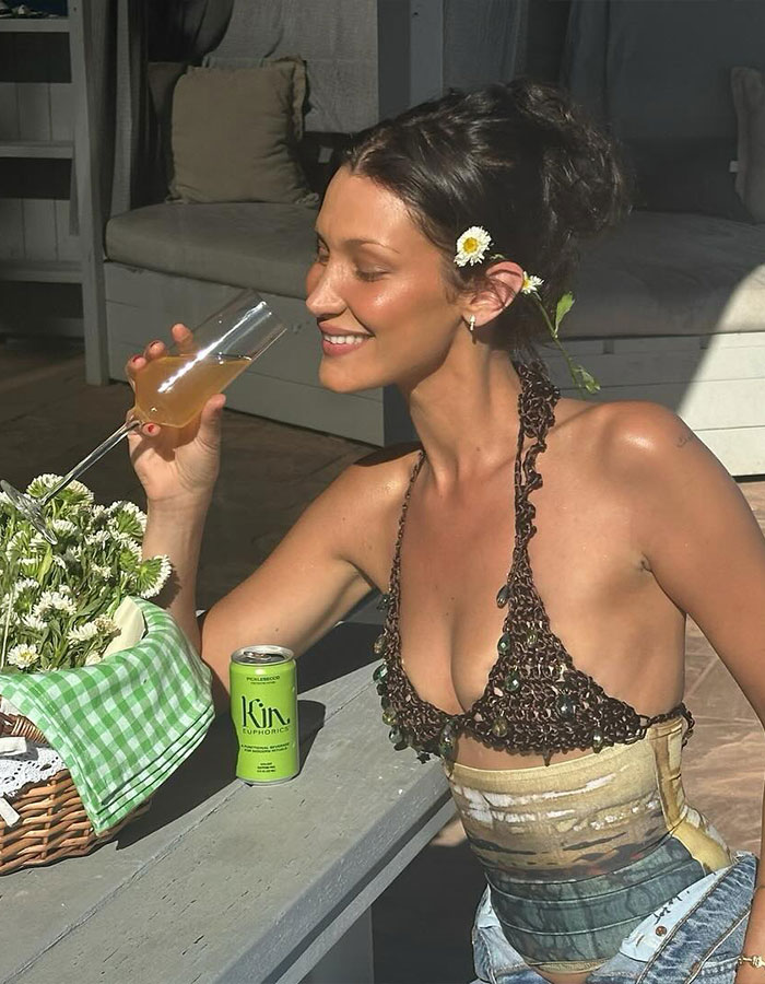 Bella Hadid's Tiny Red String Bikini In Snow Is Raising The Temperature Bella Hadid's Tiny Red String Bikini In Snow Is Raising The Temperature