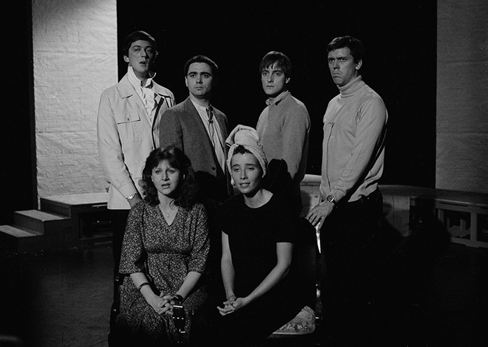 A black and white photo of a group of actors on stage, including "Whose Line Is It Anyway?" star Tony Slattery. A black and white photo of a group of actors on stage, including "Whose Line Is It Anyway?" star Tony Slattery.