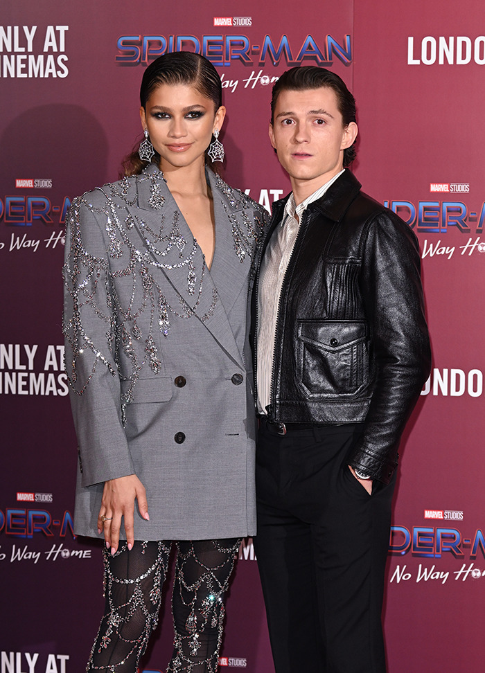 Tom Holland and Zendaya at the "Spider-Man: No Way Home" event, showcasing Hollywood style and chemistry. Tom Holland and Zendaya at the "Spider-Man: No Way Home" event, showcasing Hollywood style and chemistry.