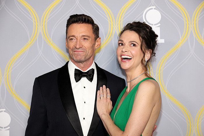 Hugh Jackman and Sutton Foster at a formal event. Hugh Jackman and Sutton Foster at a formal event.