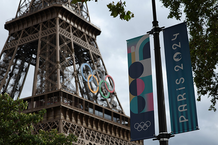 Paris 2024 Olympic sign near Eiffel Tower. Paris 2024 Olympic sign near Eiffel Tower.