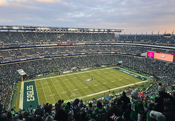 Sports fans at a crowded stadium during a game, with the field and stands visible, showcasing fan enthusiasm. Sports fans at a crowded stadium during a game, with the field and stands visible, showcasing fan enthusiasm.