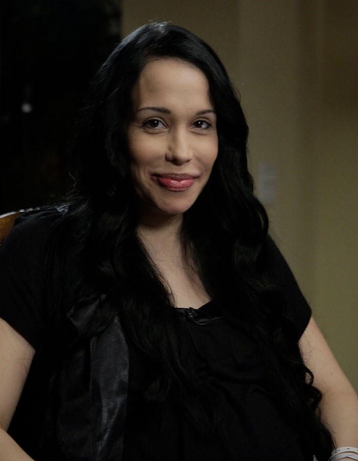 Octomom Nadya Suleman in an interview, wearing a black shirt and smiling. Octomom Nadya Suleman in an interview, wearing a black shirt and smiling.