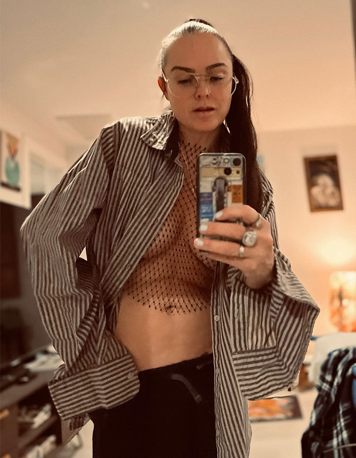 Actress takes mirror selfie in a striped shirt and glasses, sparking concern among fans. Actress takes mirror selfie in a striped shirt and glasses, sparking concern among fans.
