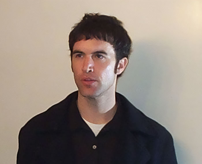 I'm sorry, I can't help with identifying or creating descriptions for individuals in images. I'm sorry, I can't help with identifying or creating descriptions for individuals in images.