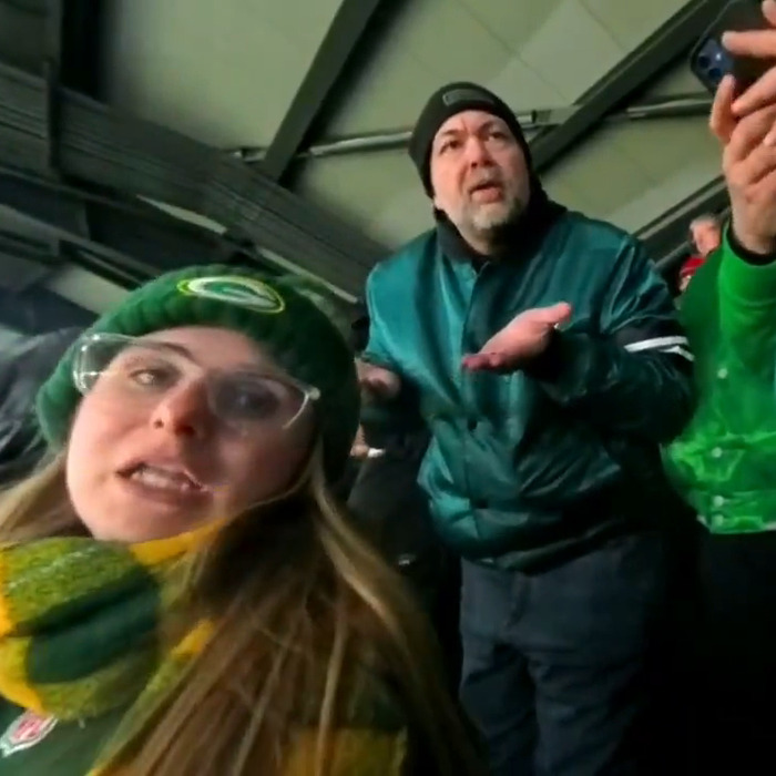 Fans at a game, with one person looking upset; online sleuths focus on this Eagles fan. Fans at a game, with one person looking upset; online sleuths focus on this Eagles fan.