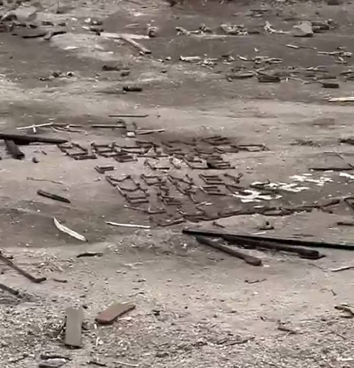 Mysterious "Help" signs visible on a barren landscape, sparking conspiracy theories. Mysterious "Help" signs visible on a barren landscape, sparking conspiracy theories.