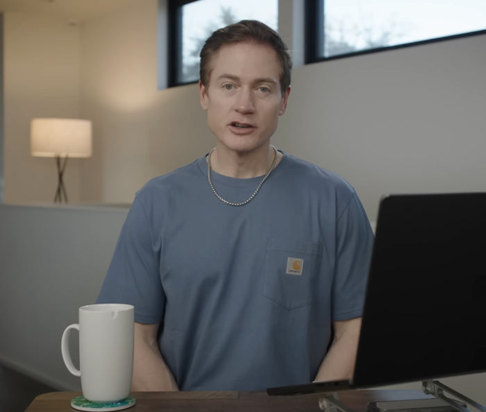 Project Baby Face mogul in casual setting with a laptop and mug. Project Baby Face mogul in casual setting with a laptop and mug.