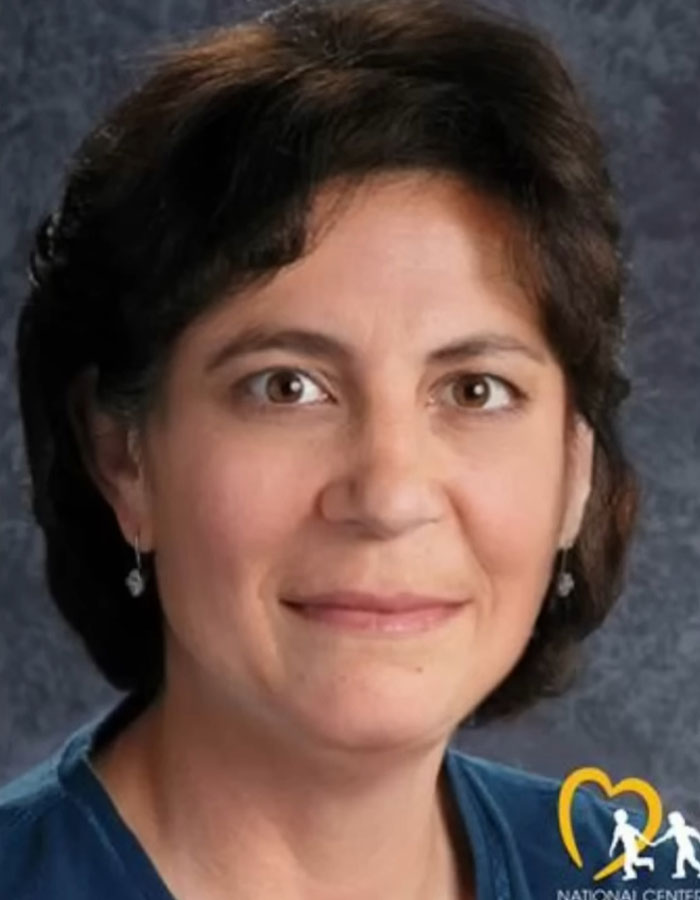 A woman with dark hair and earrings, suggesting she might be Cherrie Mahan, who vanished from a bus stop in 1985. A woman with dark hair and earrings, suggesting she might be Cherrie Mahan, who vanished from a bus stop in 1985.