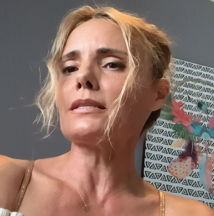 A woman with blonde hair and a concerned expression, related to AI scam incident. A woman with blonde hair and a concerned expression, related to AI scam incident.