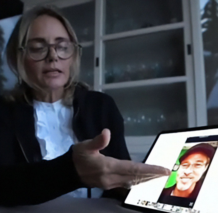 Woman showing a tablet with image, part of a scam involving fake AI and Brad Pitt. Woman showing a tablet with image, part of a scam involving fake AI and Brad Pitt.