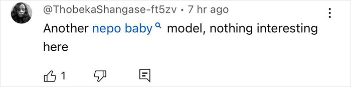 Comment discussing a model at Paris Fashion Week, labeled as a "nepo baby," with emojis for likes and replies. Comment discussing a model at Paris Fashion Week, labeled as a "nepo baby," with emojis for likes and replies.