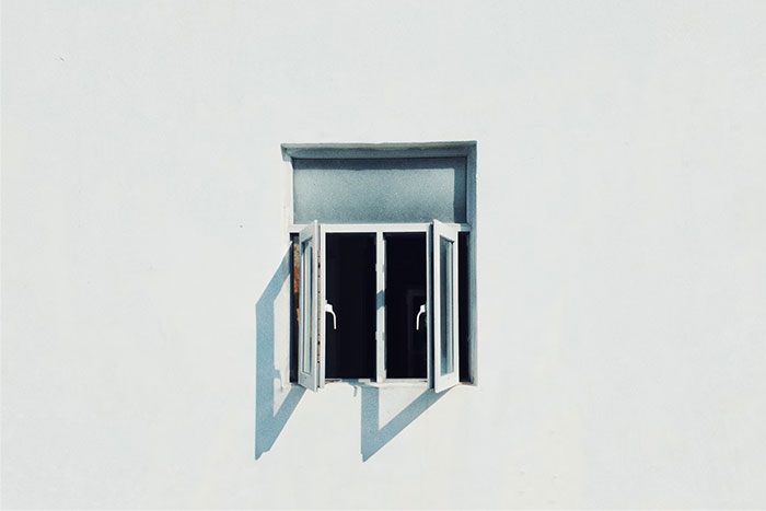 Open window on a minimalist white wall, symbolizing surprising cultural insights. Open window on a minimalist white wall, symbolizing surprising cultural insights.