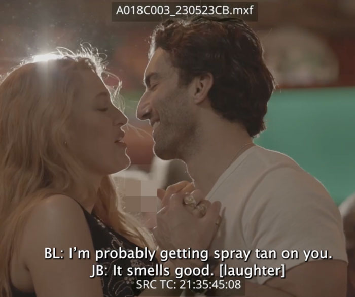 Man and woman smiling and holding hands during filming, related to video scene claim. Man and woman smiling and holding hands during filming, related to video scene claim.