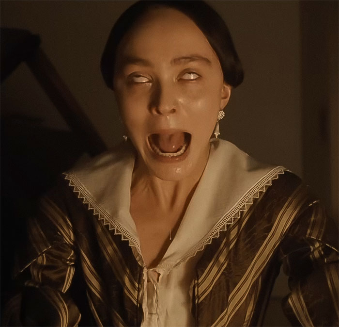 A woman in period clothing acting wide-eyed with mouth open, related to a Nosferatu audition. A woman in period clothing acting wide-eyed with mouth open, related to a Nosferatu audition.