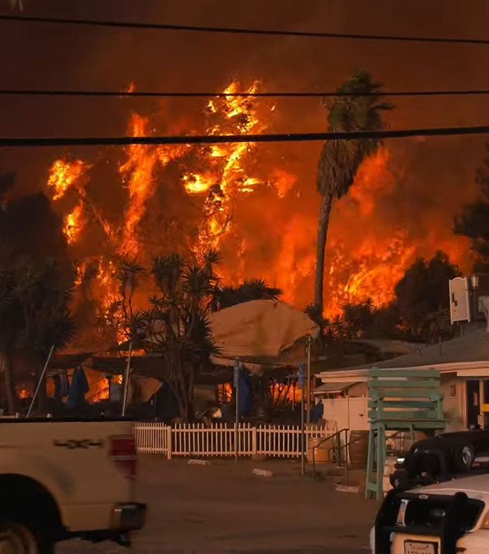 La Palisades fire raging near homes, sparking conspiracy theories. La Palisades fire raging near homes, sparking conspiracy theories.