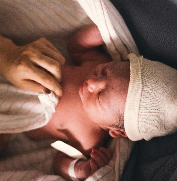 Newborn baby wrapped in a blanket, symbolizing the arrival of Generation Beta. Newborn baby wrapped in a blanket, symbolizing the arrival of Generation Beta.
