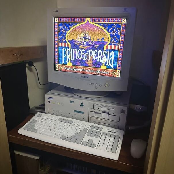 Retro computer setup with "Prince of Persia" game on the screen, evoking nostalgia for the good old days.