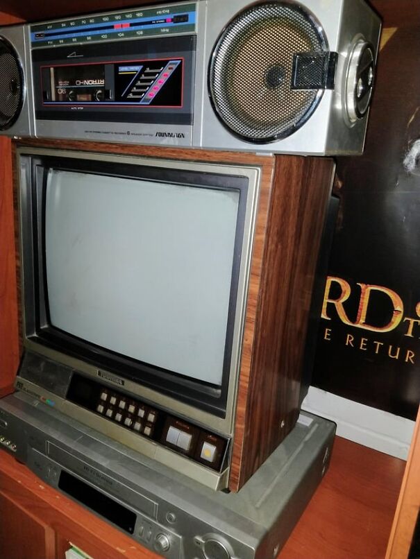 Retro find: Vintage television set with built-in stereo speakers and a VCR, evoking nostalgia for the good old days.