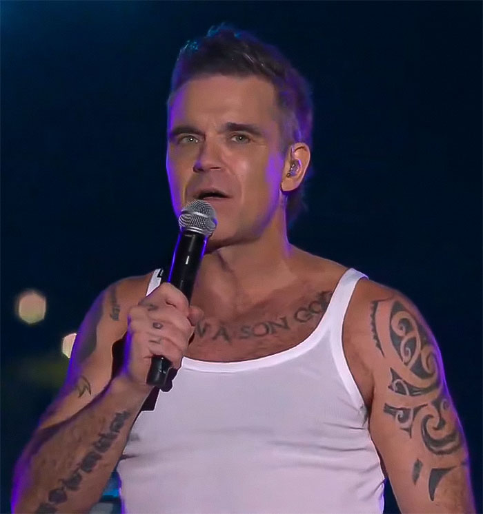 “Never Seen Anything Like That”: Robbie Williams Slammed For Blaming Fan For Mistake At NYE Gig “Never Seen Anything Like That”: Robbie Williams Slammed For Blaming Fan For Mistake At NYE Gig