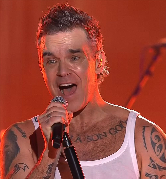 “Never Seen Anything Like That”: Robbie Williams Slammed For Blaming Fan For Mistake At NYE Gig “Never Seen Anything Like That”: Robbie Williams Slammed For Blaming Fan For Mistake At NYE Gig