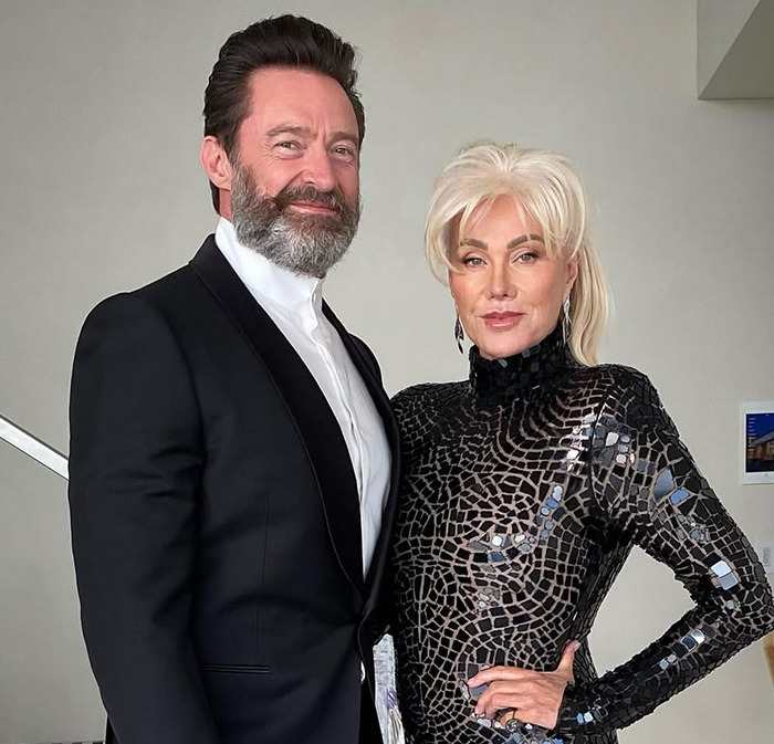 Deborra-Lee Furness posing together with Hugh Jackman indoors. Deborra-Lee Furness posing together with Hugh Jackman indoors.