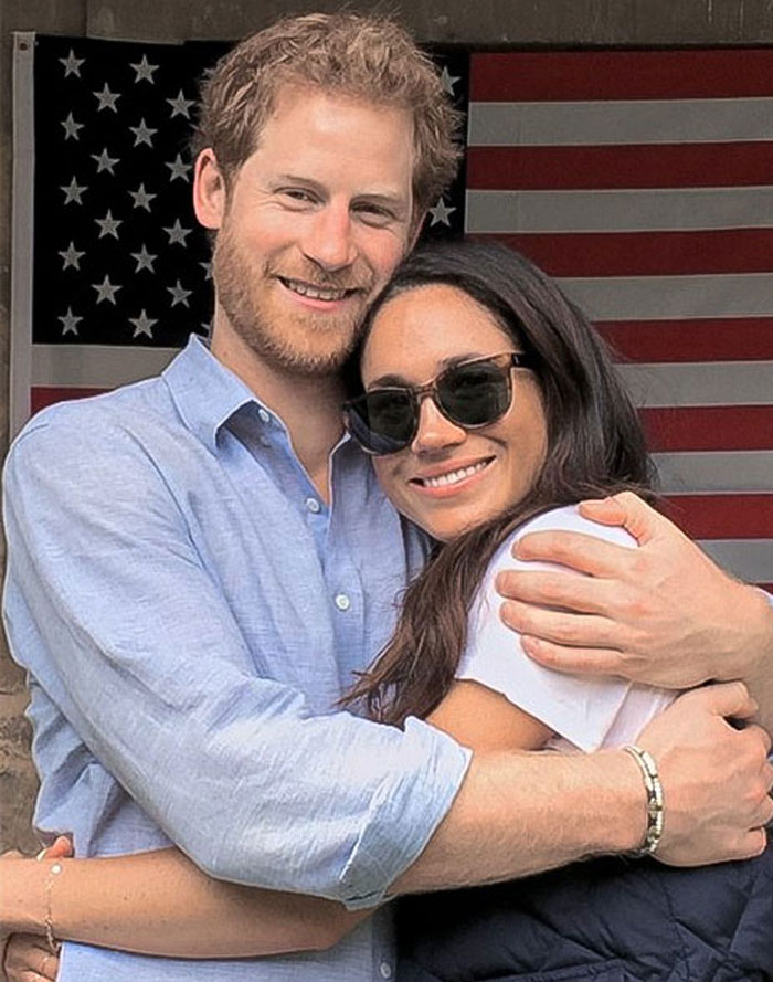 A couple embracing in front of an American flag, with a focus on the theme of self-promotion and charity work. A couple embracing in front of an American flag, with a focus on the theme of self-promotion and charity work.