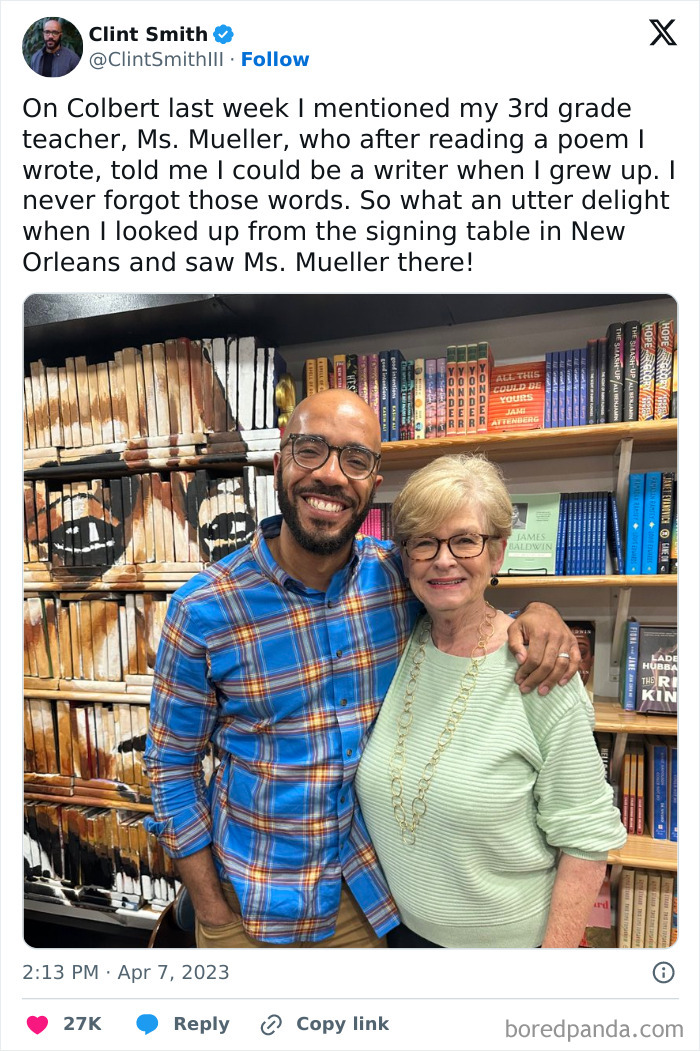 Man in plaid shirt smiling with a woman in a bookstore, surrounded by uplifting positivity.