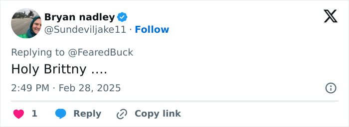 Tweet responding to @FearedBuck, expressing surprise with the words "Holy Brittny.... Tweet responding to @FearedBuck, expressing surprise with the words "Holy Brittny....