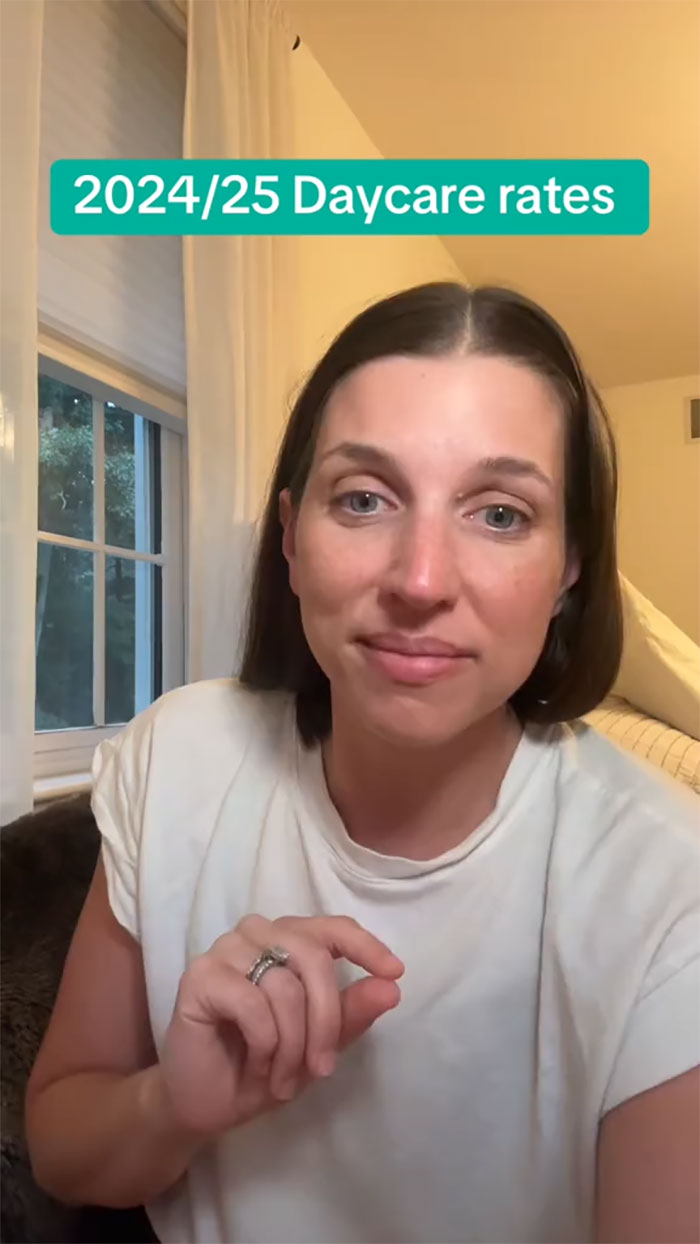 A mom discusses 2024/25 daycare rates and young people not affording kids, wearing a white shirt in a cozy room. A mom discusses 2024/25 daycare rates and young people not affording kids, wearing a white shirt in a cozy room.