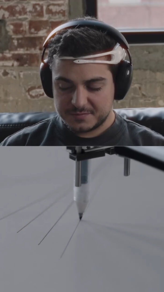 Man wears headset capturing brain activity imprint, connected to tattoo machine. Man wears headset capturing brain activity imprint, connected to tattoo machine.