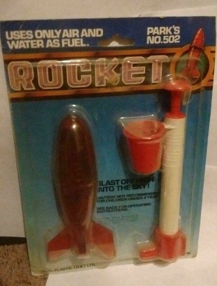 Vintage toy rocket packaging, labeled "Park's No. 502," claims to use air and water as fuel, evoking nostalgia.