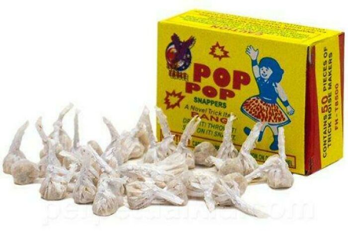 Box of Pop Pop snappers with wrapped packets, evoking nostalgia and making you feel old.