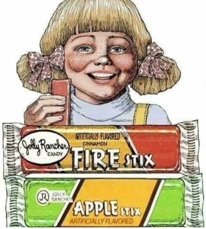 Child holding Jolly Rancher candy, Fire Stix and Apple Stix flavors, evoking nostalgia.