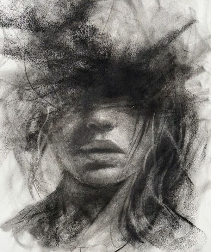 Charcoal portrait by Josh Hernandez, depicting a face obscured by expressive, swirling strokes.