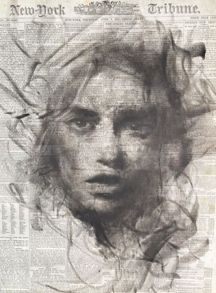 Charcoal portrait on newspaper by artist Josh Hernandez, showcasing intricate facial details and dynamic brush strokes.