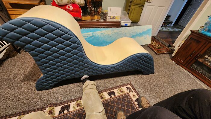 Quilted chaise lounge in a cozy room, showcasing a creative DIY project.