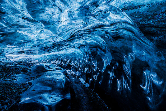 Vibrant blue ice formations from the World Nature Photographer of the Year 2025.