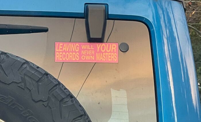 Car window sticker with confusing message sign fail: "Leaving Your Records Will Never Own Masters."