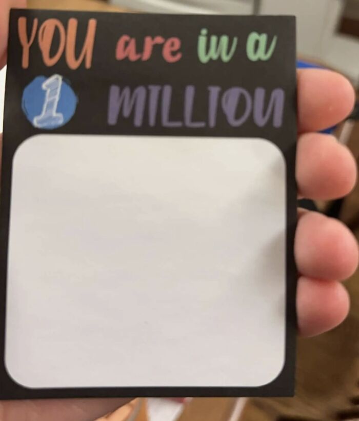 Hand holding a note with a sign fail: "YOU are in a 1 milliou."