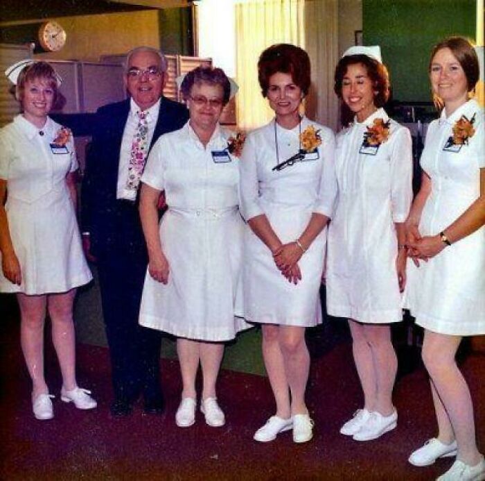 Vintage group photo of nurses and a man, reflecting nostalgic pics from people realizing they’re old now.