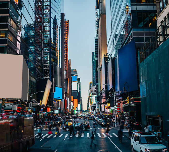 Night scene in NYC with busy streets and bright lights, related to a woman's midnight journey home. Night scene in NYC with busy streets and bright lights, related to a woman's midnight journey home.