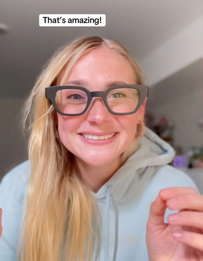 Deaf girl smiling, wearing augmented reality glasses, experiencing spoken words visually for the first time. Deaf girl smiling, wearing augmented reality glasses, experiencing spoken words visually for the first time.