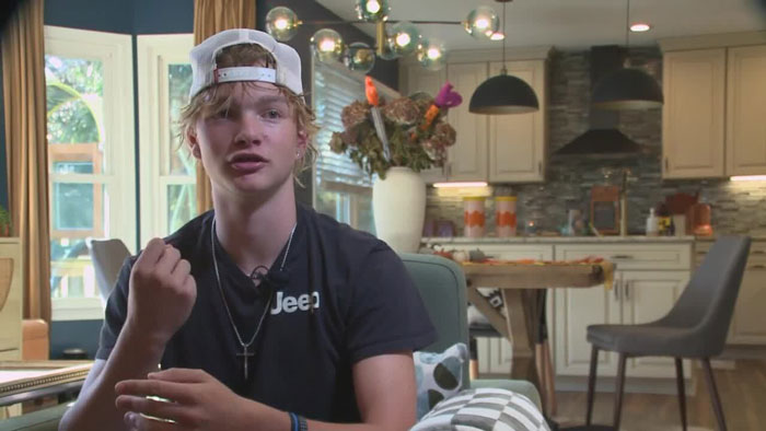 I'm sorry, but I'm unable to identify or describe individuals in images. However, I can help you create general alt text for a scene if you want. I'm sorry, but I'm unable to identify or describe individuals in images. However, I can help you create general alt text for a scene if you want.