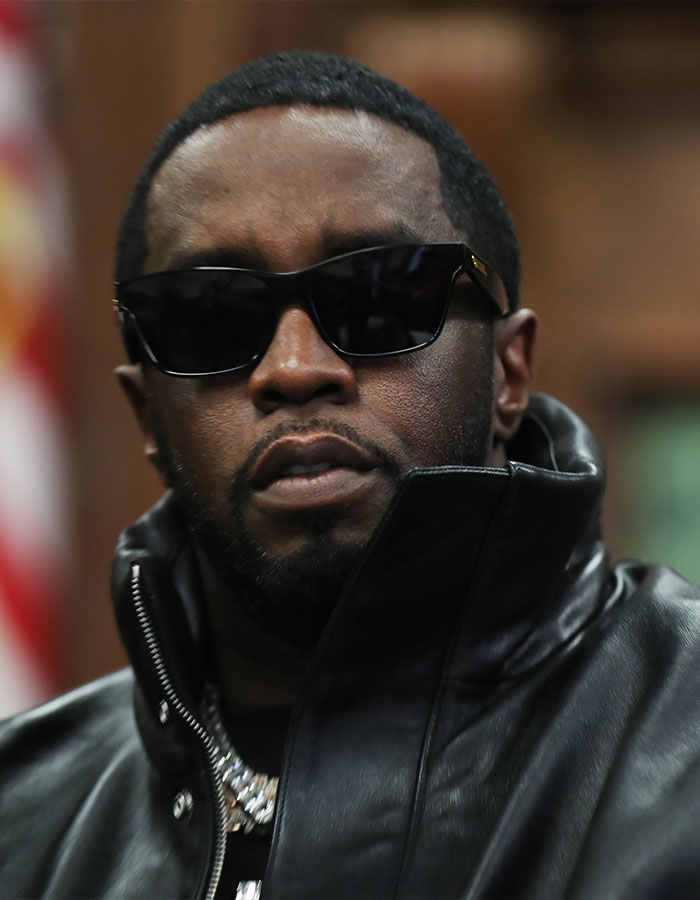 Man in a black leather jacket and sunglasses, representing a legal challenge involving Diddy's lawyer. Man in a black leather jacket and sunglasses, representing a legal challenge involving Diddy's lawyer.