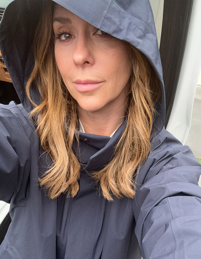 Woman in a hooded jacket taking a bare-faced selfie, highlighting a strong message on aging. Woman in a hooded jacket taking a bare-faced selfie, highlighting a strong message on aging.