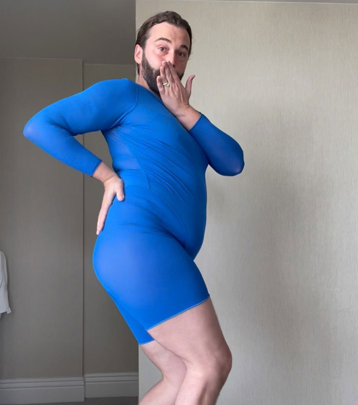 Person in a blue bodysuit striking a playful pose, highlighting drastic weight loss transformation. Person in a blue bodysuit striking a playful pose, highlighting drastic weight loss transformation.