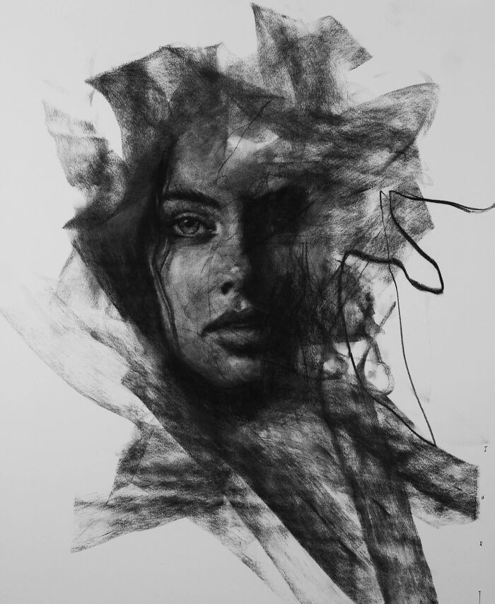 Charcoal portrait by Josh Hernandez, depicting an expressive face with abstract shading and intricate details.