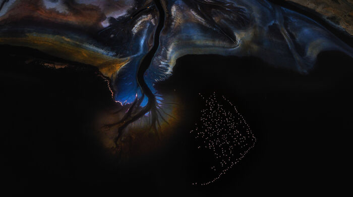 Aerial view of vibrant river delta at night from the 2024 Nature inFocus Photography Contest.